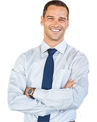 smiling man in business attire with arms crossed